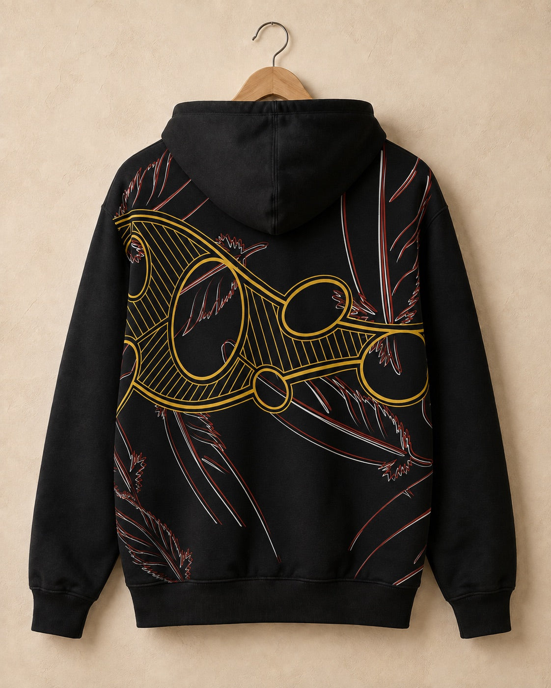 Black hoodie with hand-drawn artwork on a hanger